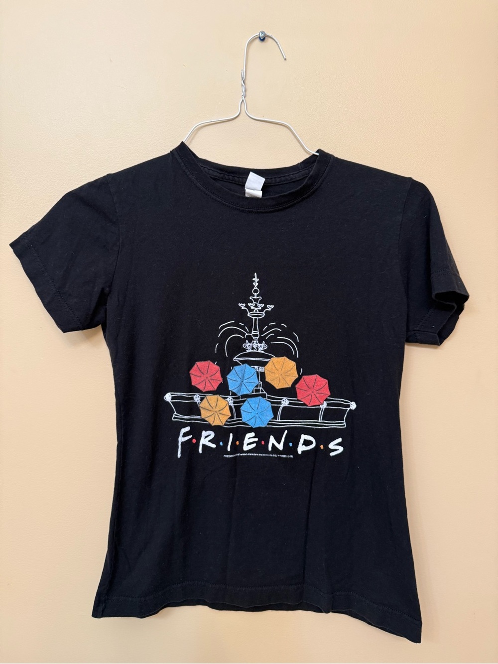 FRIENDS Black Short Sleeve Tee with Red, Blue & Gold Umbrella Graphic